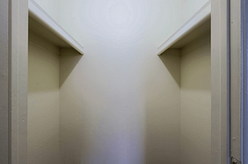 A large closet with white paint and shelving at Sahuaro West Phoenix, Arizona 85029